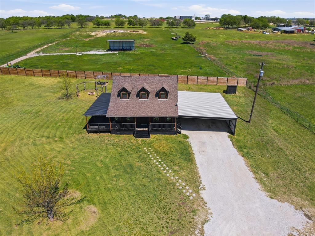 1865 Old Denton Highway Decatur, TX 76234 - Photo 32 of 35 a view of a lake with a house in the background