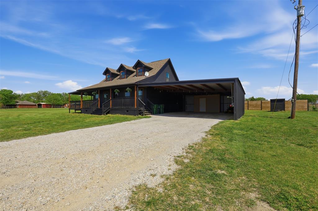 1865 Old Denton Highway Decatur, TX 76234 - Photo 4 of 35 a front view of a house with a yard