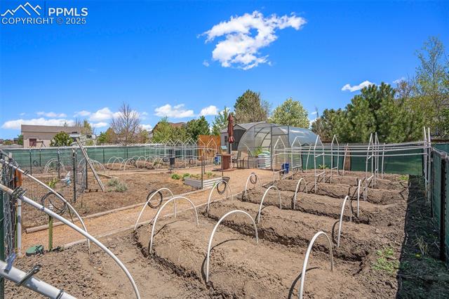 9709 Rockingham Drive Peyton, CO 80831 - Photo 41 of 50 Beautiful gardening opportunity complete with drip lines, greenhouse and storage shed