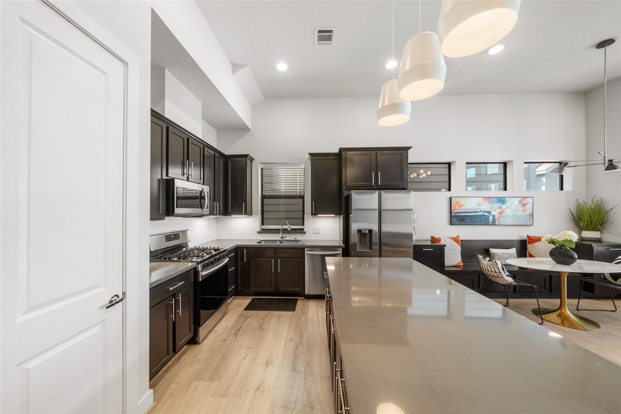 2616 Riverside Drive, Unit M Houston, TX 77004 - Photo 16 of 28 a large kitchen with stainless steel appliances lots of counter top space
