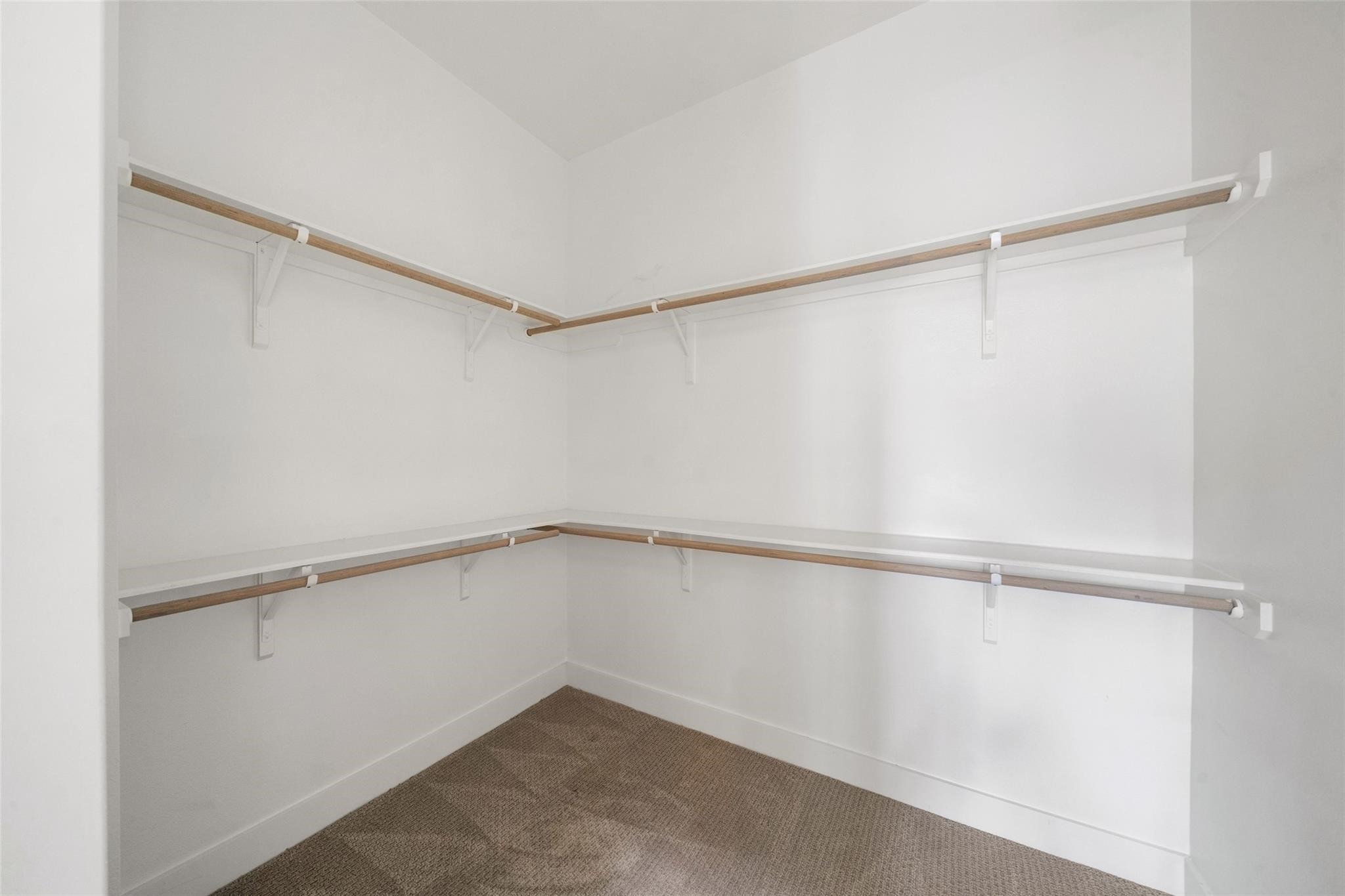 2616 Riverside Drive, Unit M Houston, TX 77004 - Photo 24 of 28 a view of an empty walk in closet