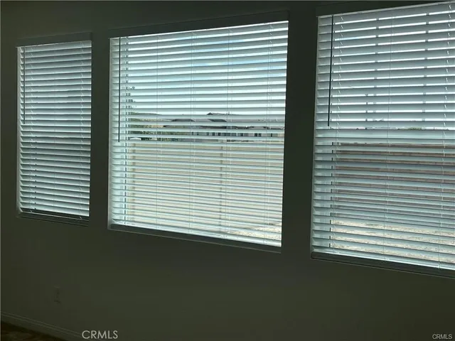 a view of a backyard of the house