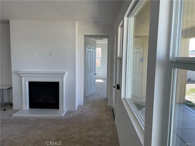 a view of a livingroom with a fireplace