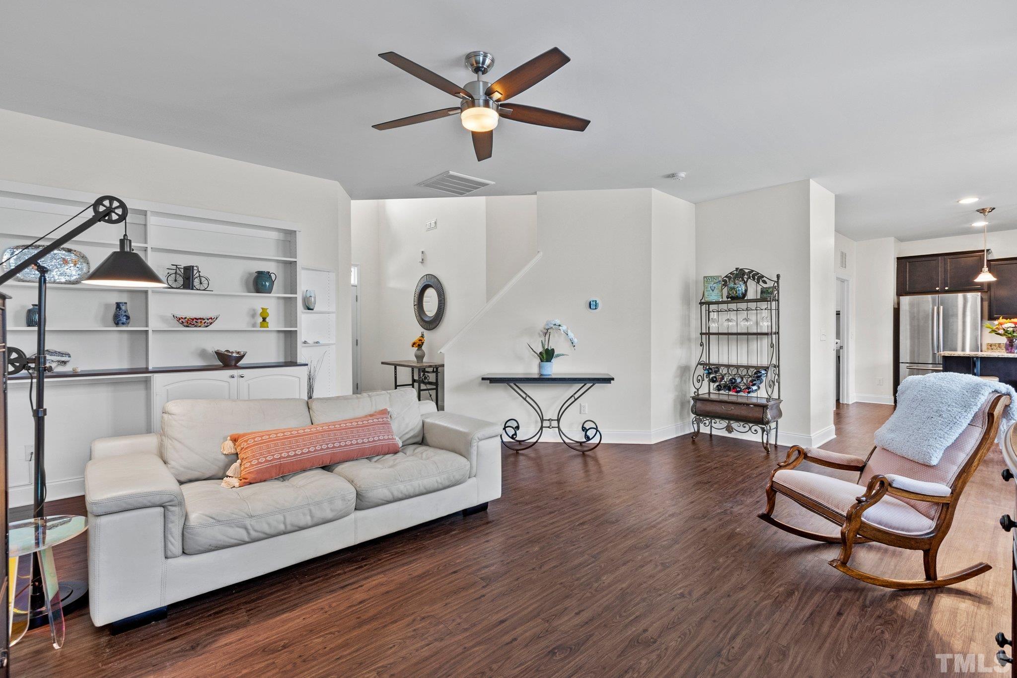3229 Revelation Street Raleigh, NC 27610 - Photo 15 of 45 a living room with furniture and a wooden floor