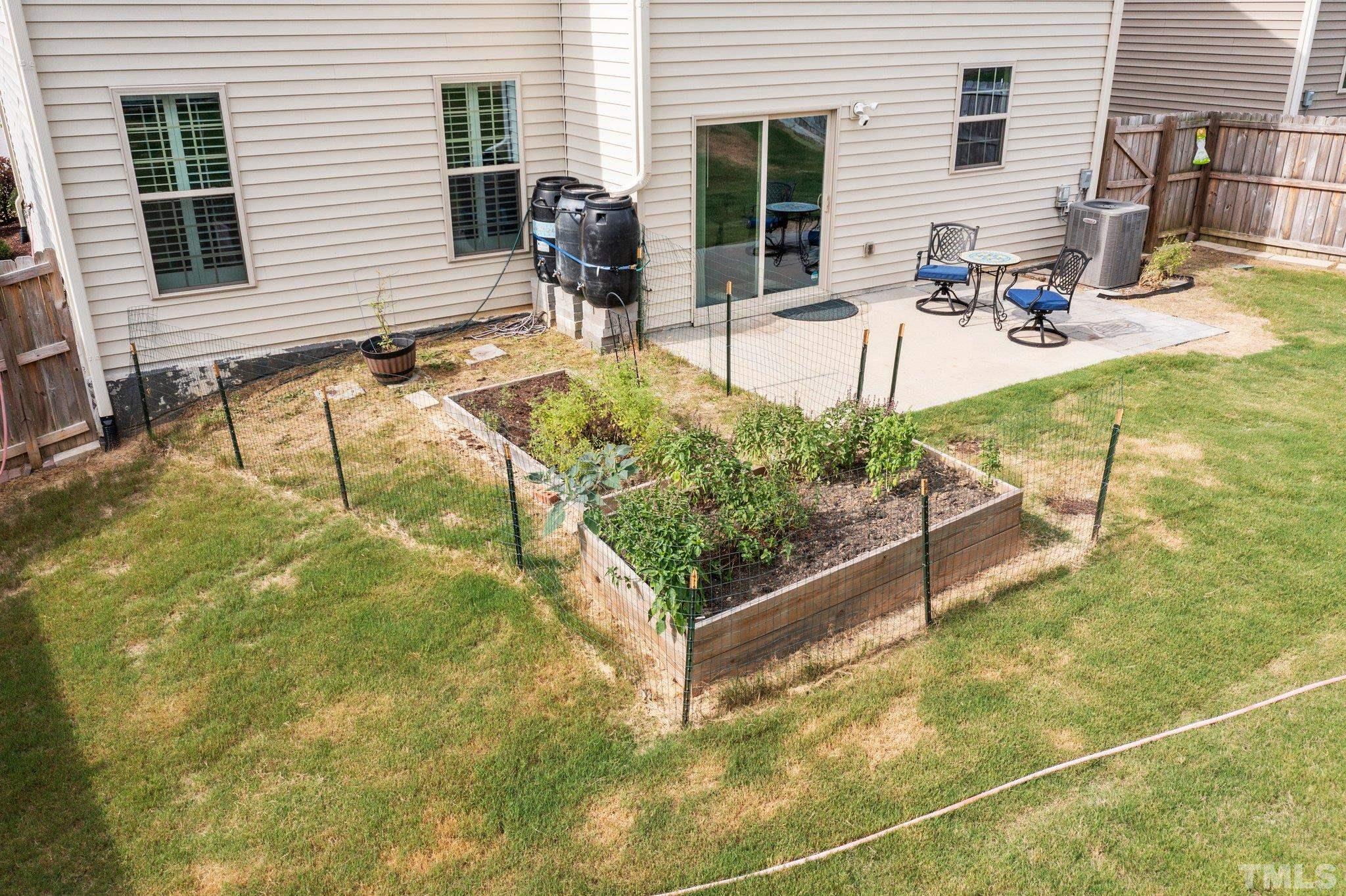 3229 Revelation Street Raleigh, NC 27610 - Photo 44 of 45 a view of a house with backyard and sitting area