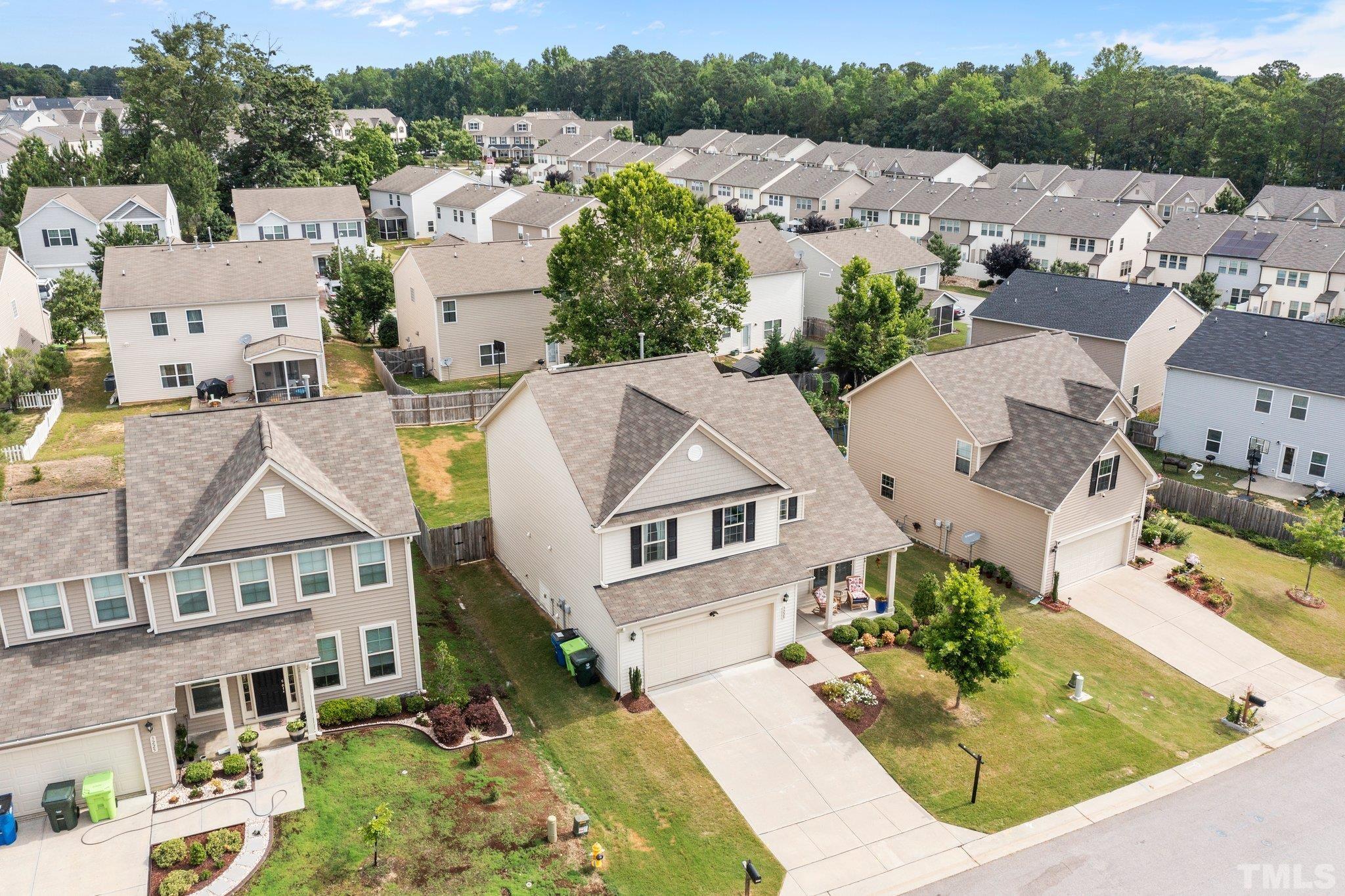 3229 Revelation Street Raleigh, NC 27610 - Photo 8 of 45 an aerial view of a house with a garden