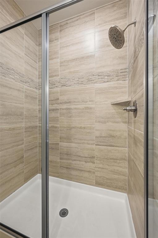 4624 Piedras Lanzar Drive McKinney, TX 75070 - Photo 13 of 20 a bathroom with a shower