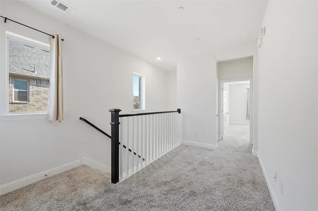 a view of a hallway with entryway