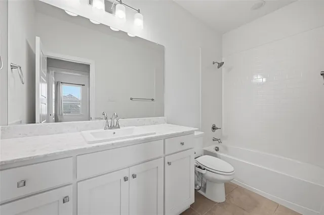 a view of bathroom with a sink a toilet and a bathtub