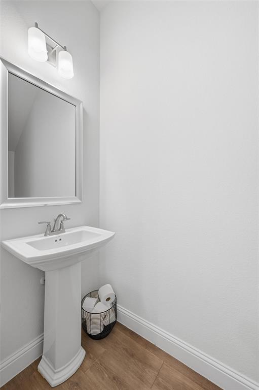 4624 Piedras Lanzar Drive McKinney, TX 75070 - Photo 9 of 20 a bathroom with a sink and a mirror
