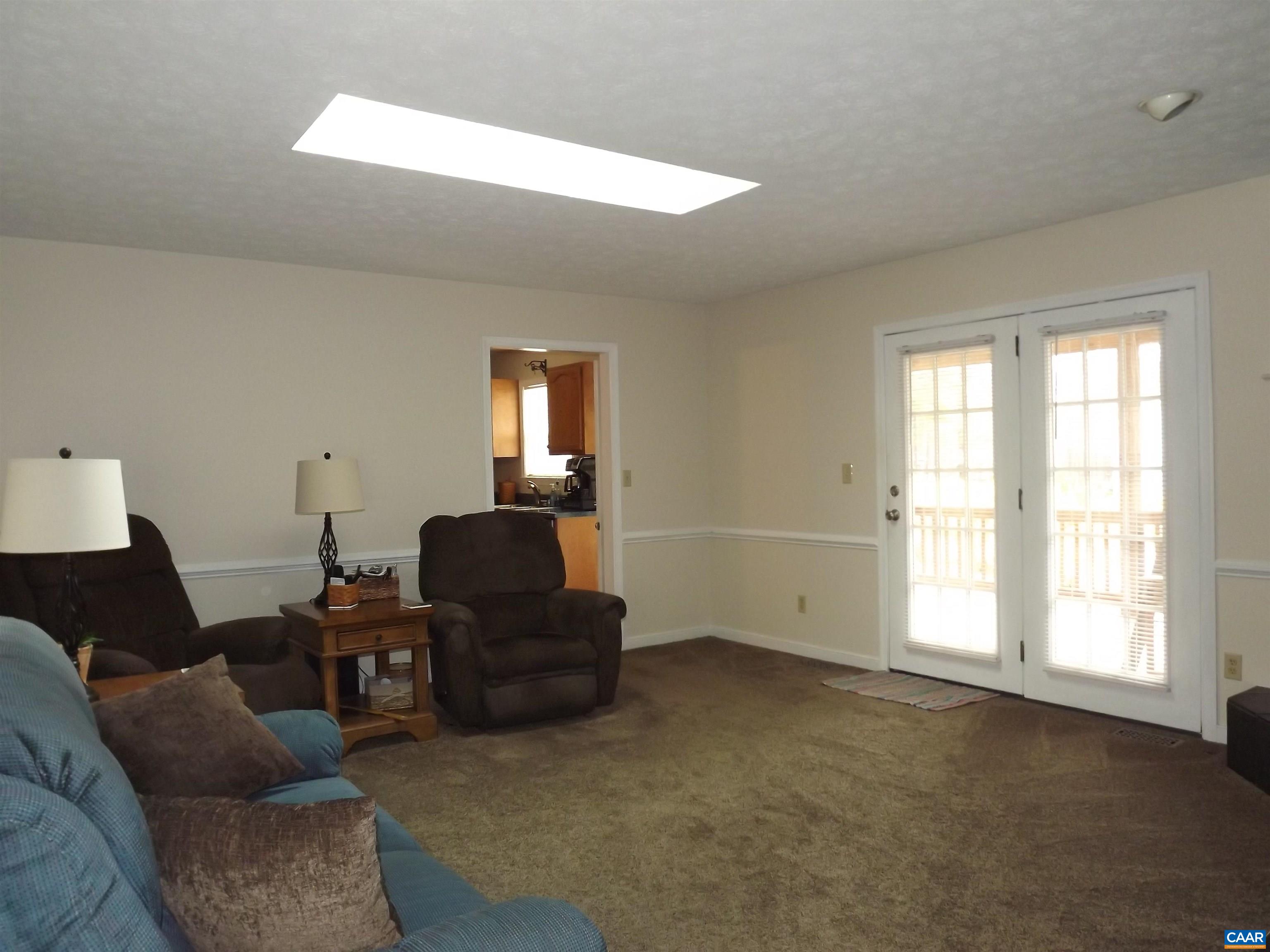 16 Powhatan Road Palmyra, VA 22963 - Photo 12 of 30 a living room with furniture and a window