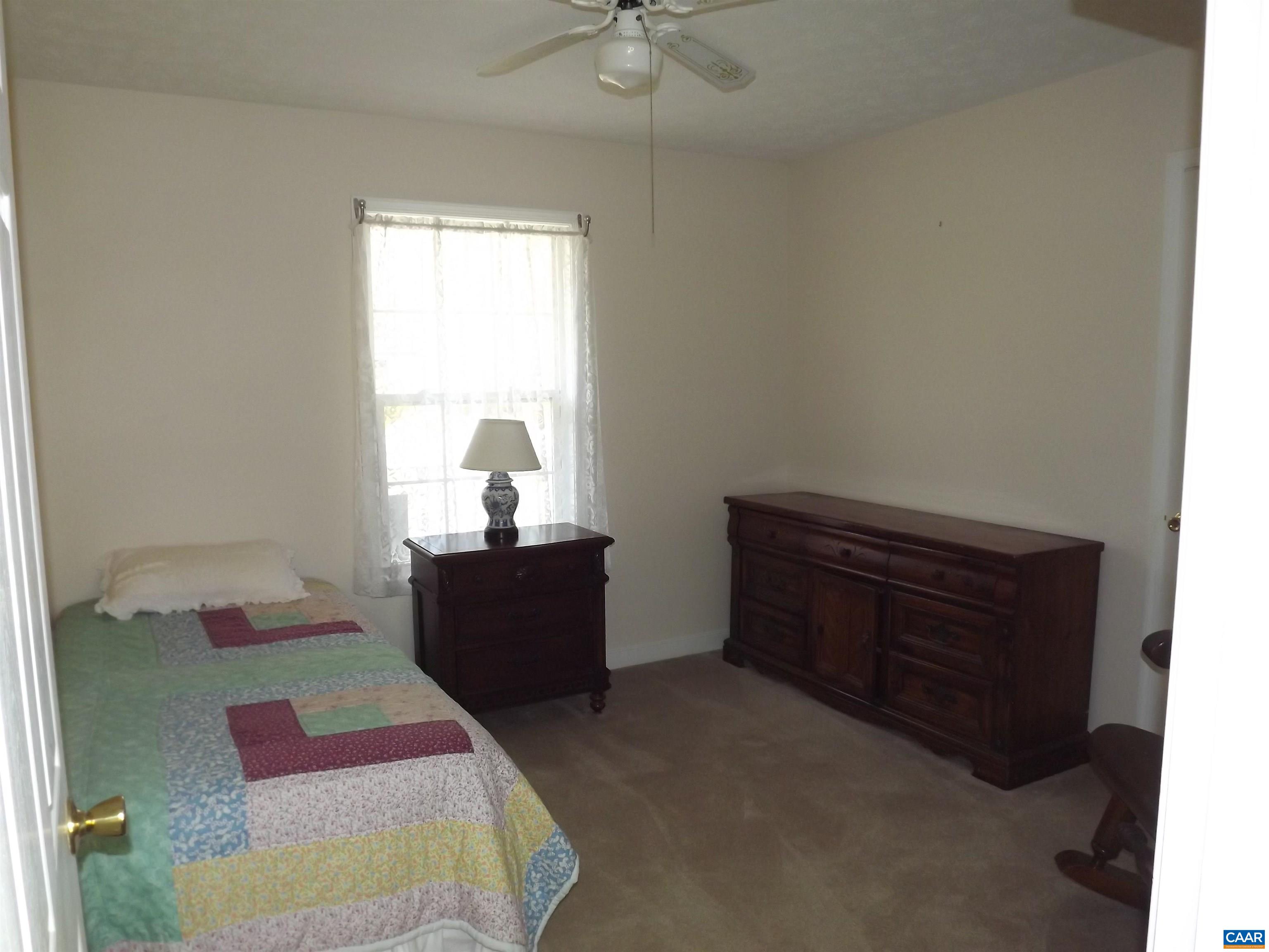 16 Powhatan Road Palmyra, VA 22963 - Photo 28 of 30 a bed room with a bed and a window