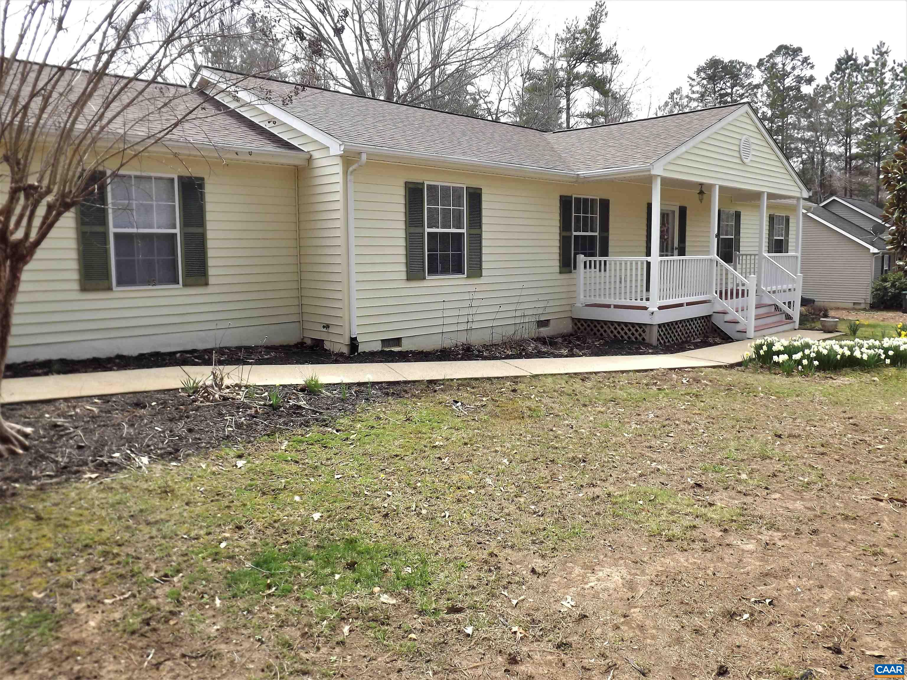 16 Powhatan Road Palmyra, VA 22963 - Photo 30 of 30 a view of house with yard and trees in the background