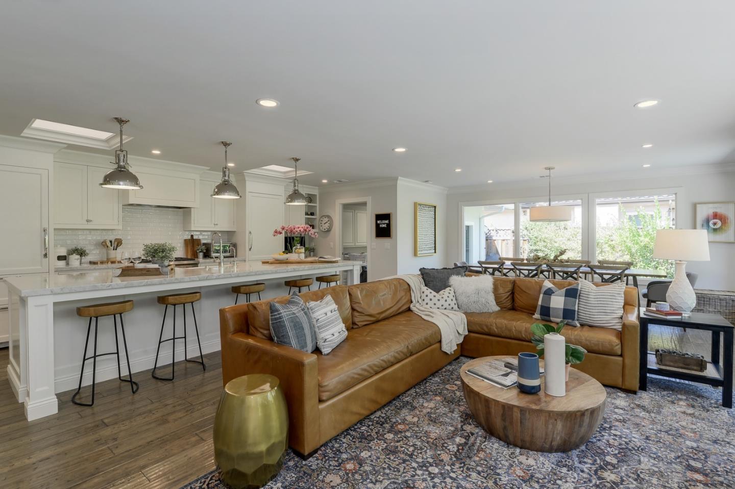 1261 Springer Road Los Altos, CA 94024 - Photo 12 of 32 a living room with furniture and a wooden floor