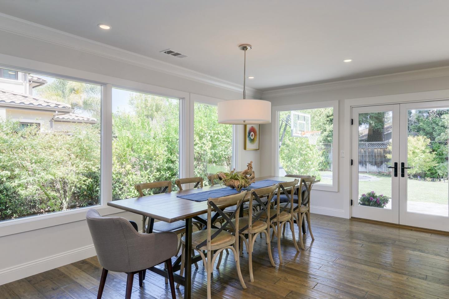 1261 Springer Road Los Altos, CA 94024 - Photo 15 of 32 a view of a dining room with furniture window and wooden floor