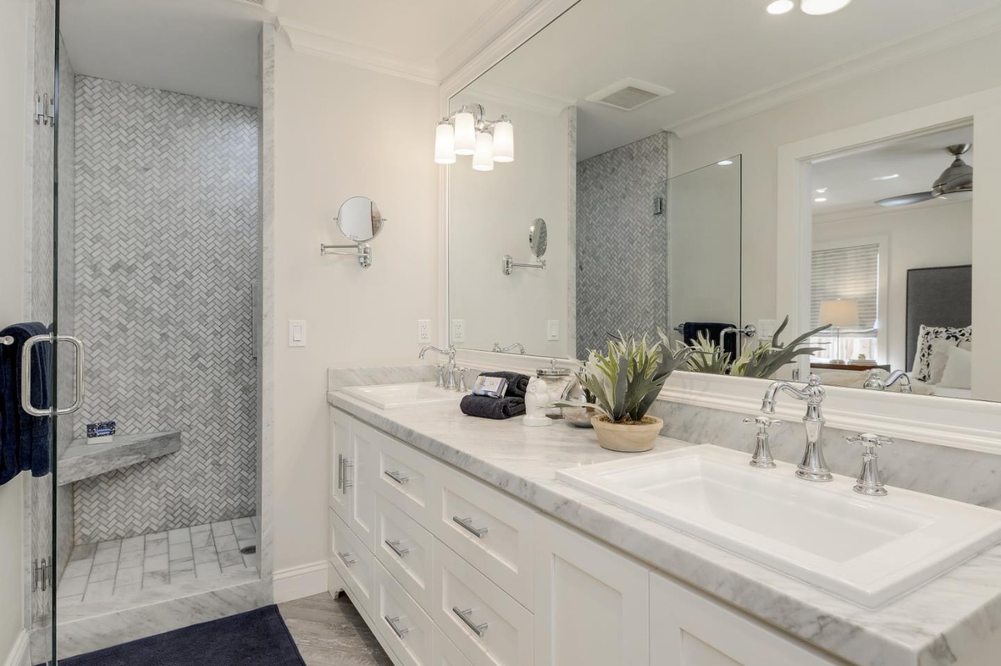 1261 Springer Road Los Altos, CA 94024 - Photo 20 of 32 a bathroom with a double vanity sink mirror and shower