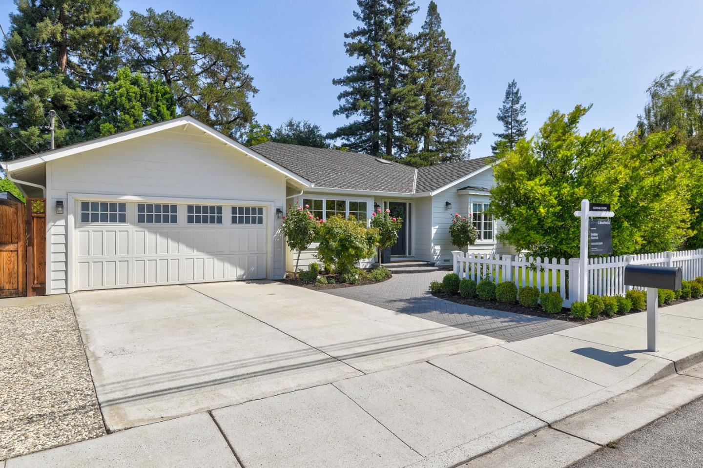 1261 Springer Road Los Altos, CA 94024 - Photo 3 of 32 a view of a house with a small yard and plants