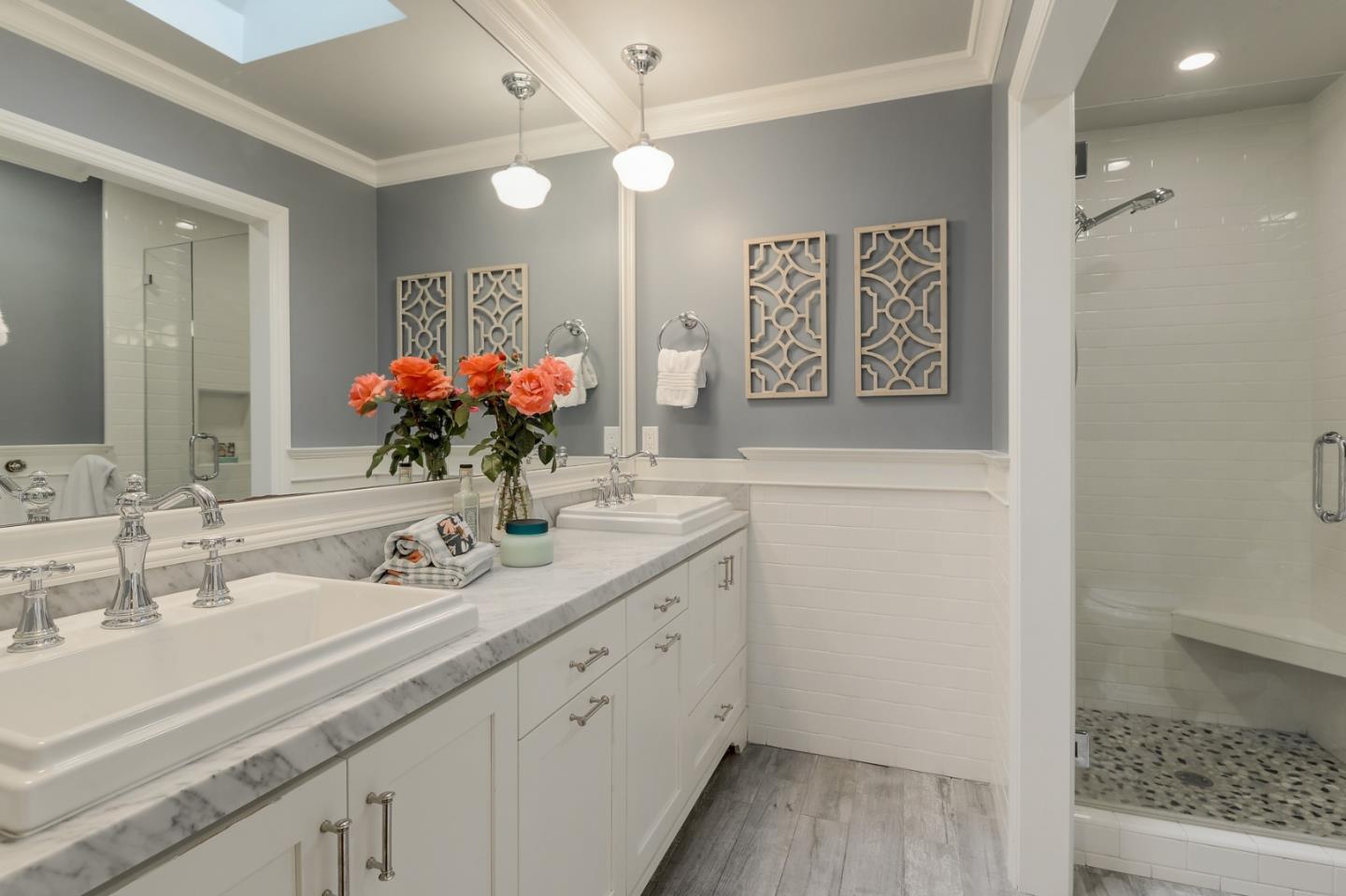 1261 Springer Road Los Altos, CA 94024 - Photo 21 of 32 a bathroom with a sink a vanity and a mirror