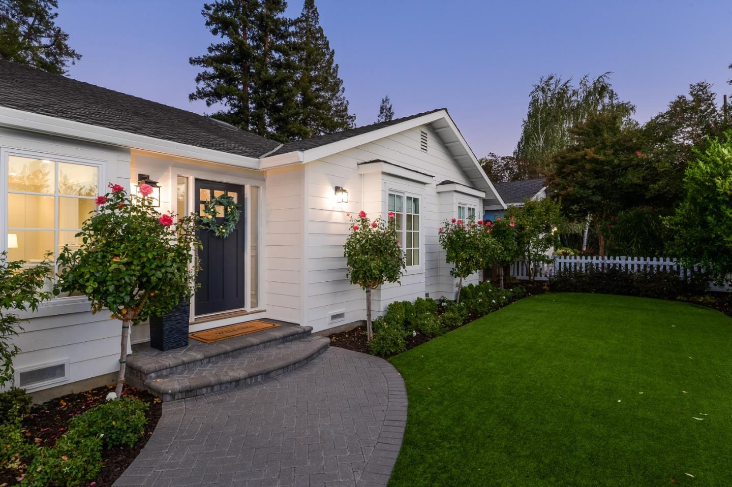 1261 Springer Road Los Altos, CA 94024 - Photo 5 of 32 a front view of a house with garden