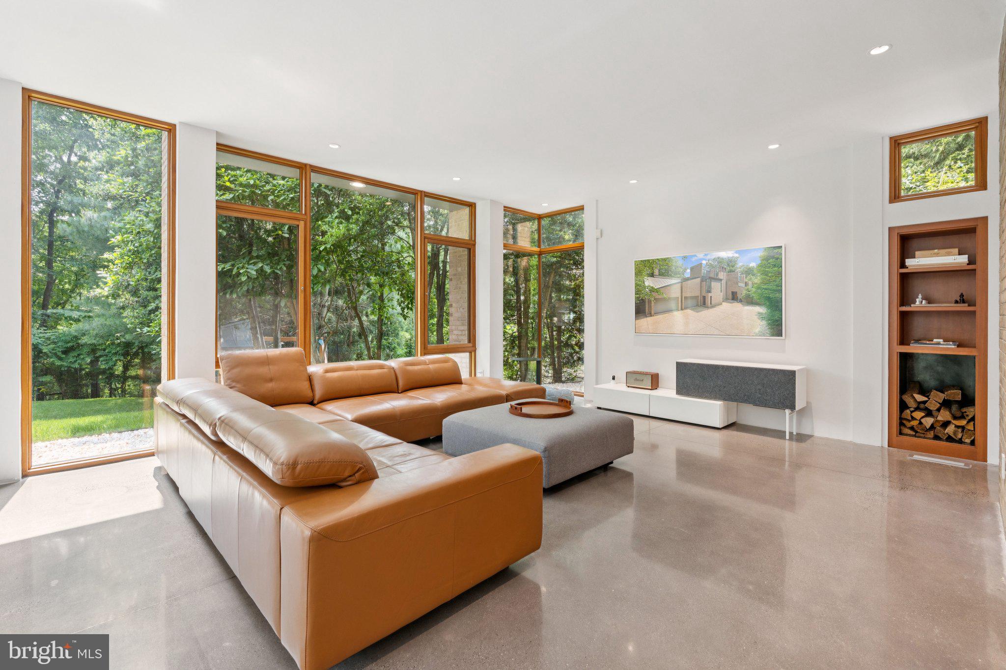 400 Chain Bridge Road McLean, VA 22101 - Photo 16 of 31 a living room with furniture and a large window