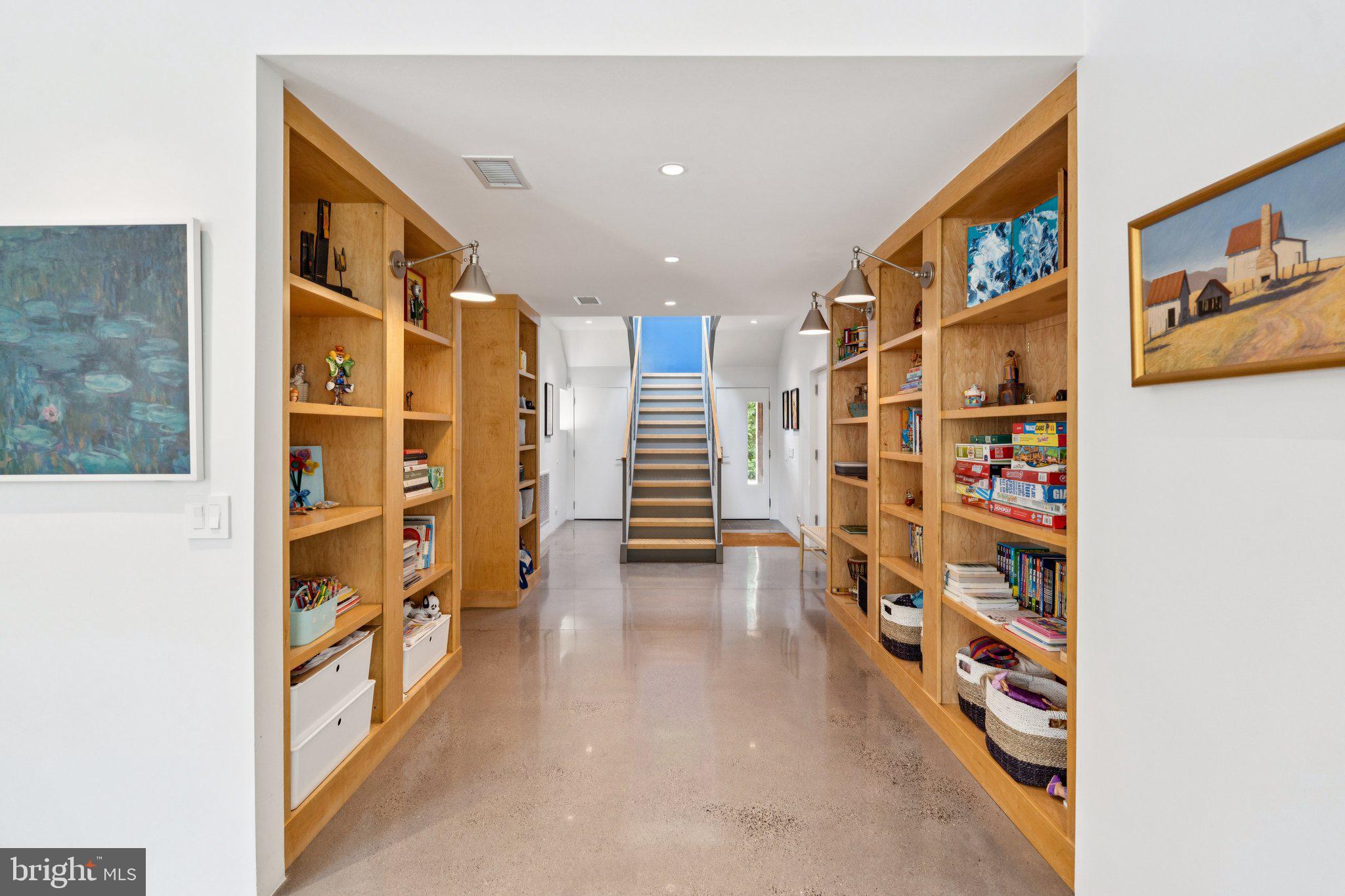 400 Chain Bridge Road McLean, VA 22101 - Photo 17 of 31 a view of walk in closet with clothes and shoes