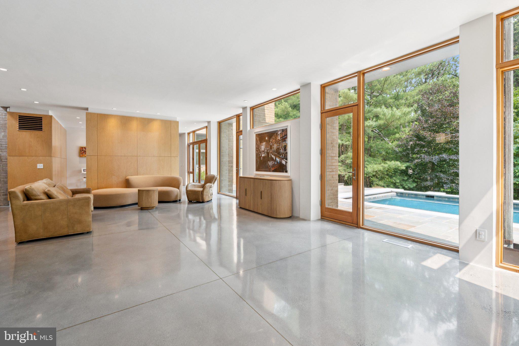 400 Chain Bridge Road McLean, VA 22101 - Photo 18 of 30 a living room with furniture and large windows
