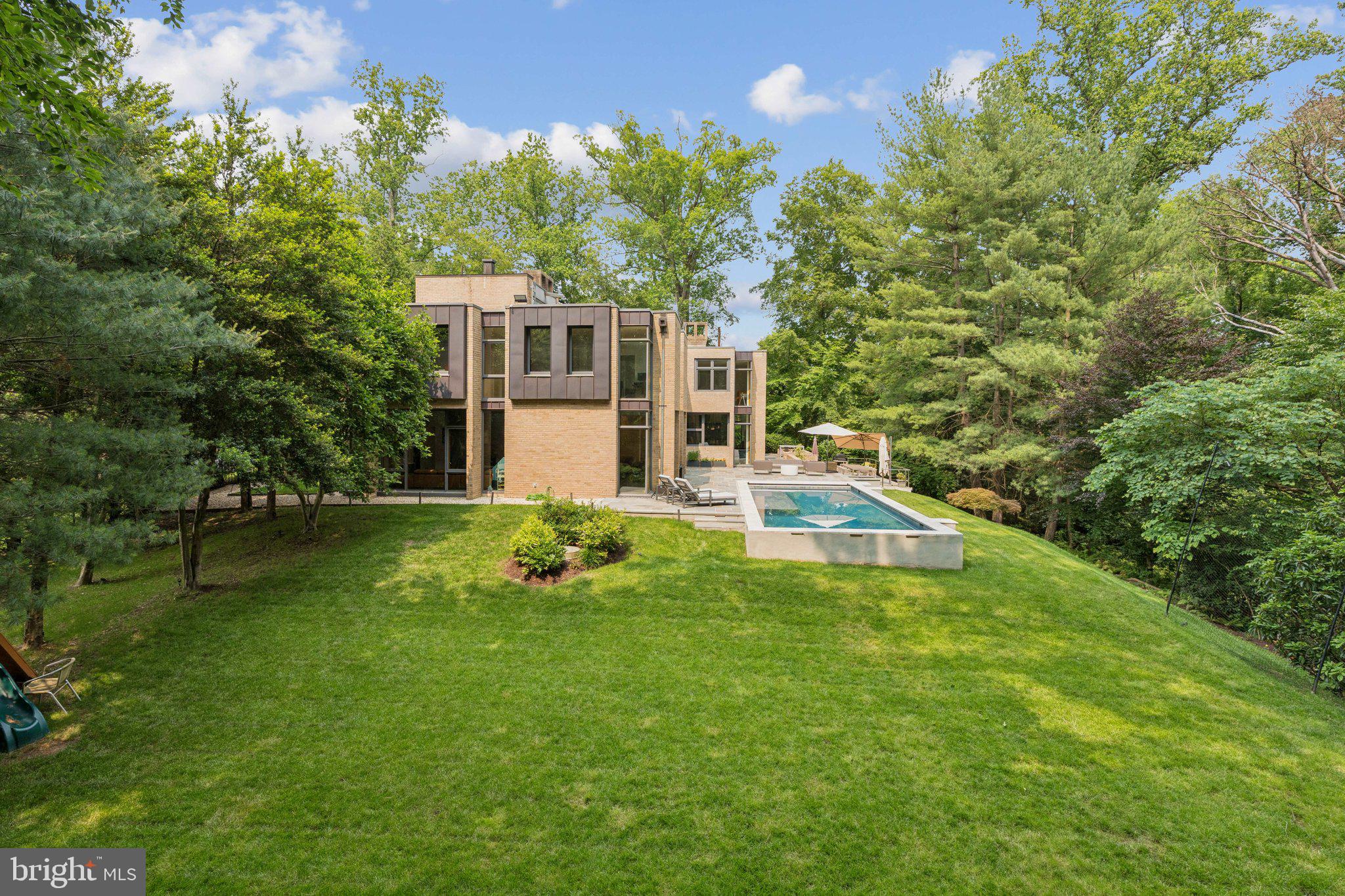 400 Chain Bridge Road McLean, VA 22101 - Photo 30 of 31 a view of a house with a yard porch and sitting area