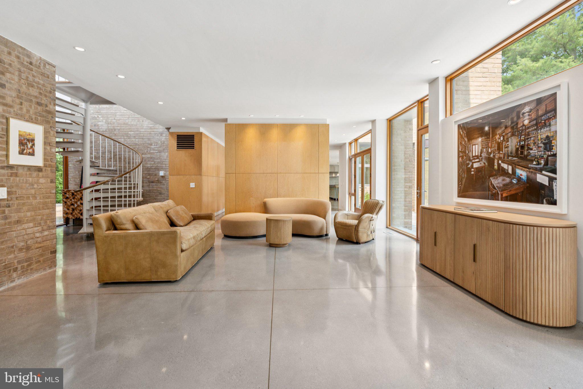 400 Chain Bridge Road McLean, VA 22101 - Photo 6 of 30 a living room with furniture and a large window