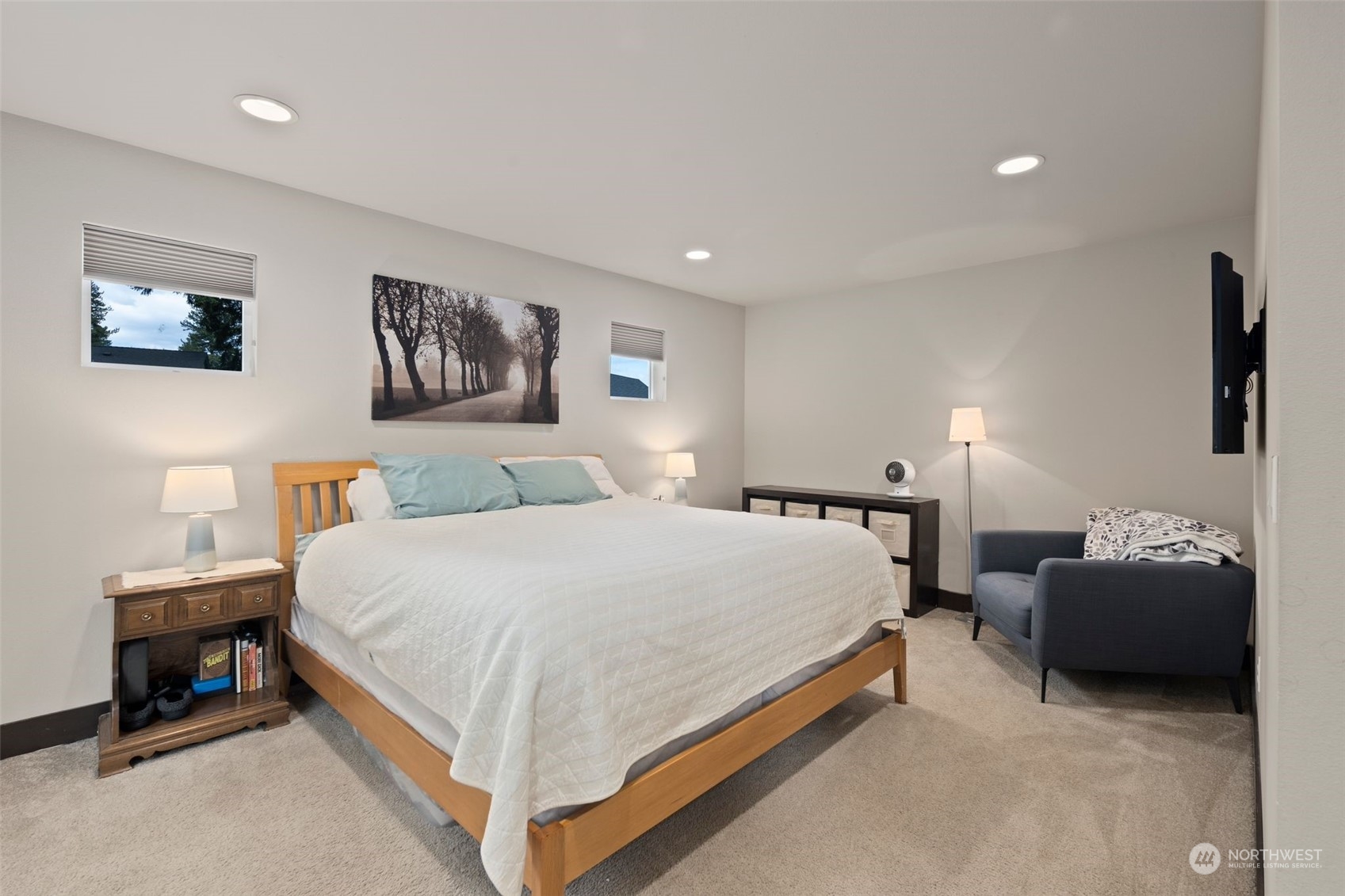 417 196th Street Southeast Bothell, WA 98012 - Photo 18 of 40 a bedroom with bed and a lamp