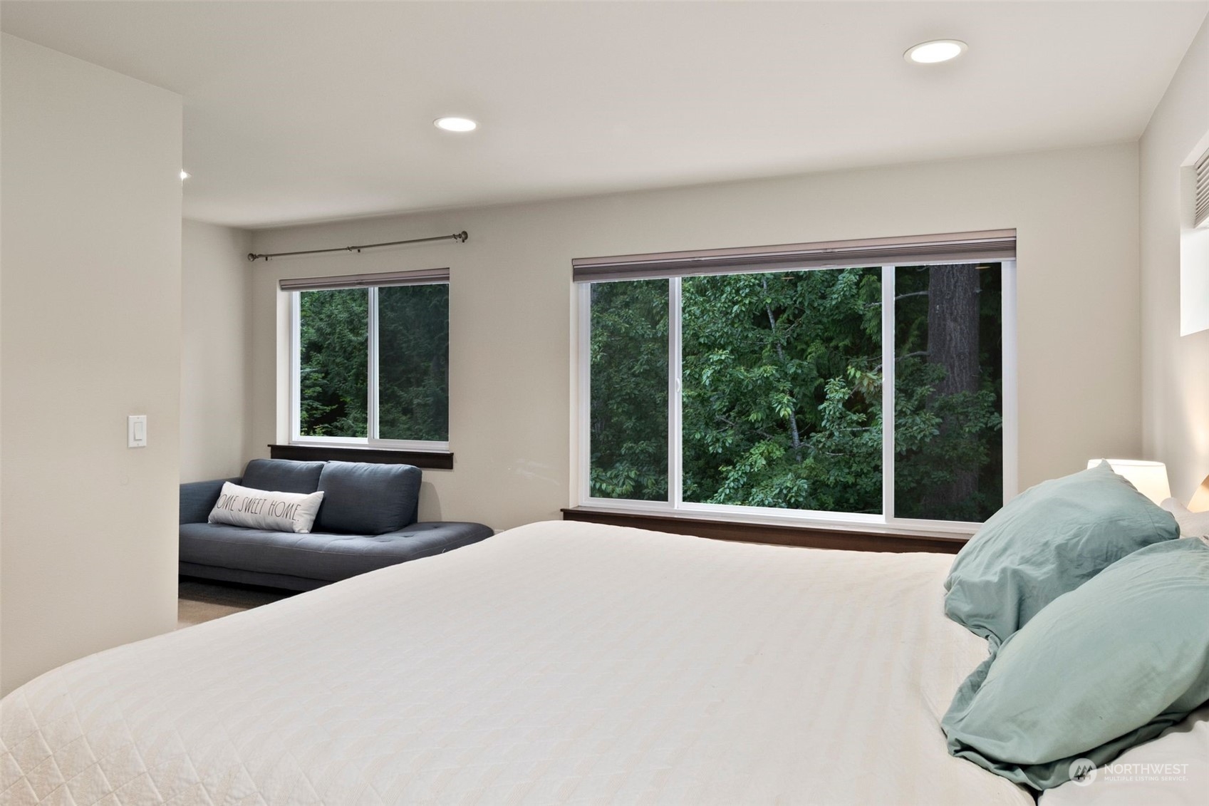 417 196th Street Southeast Bothell, WA 98012 - Photo 20 of 40 a bedroom with furniture and a large window