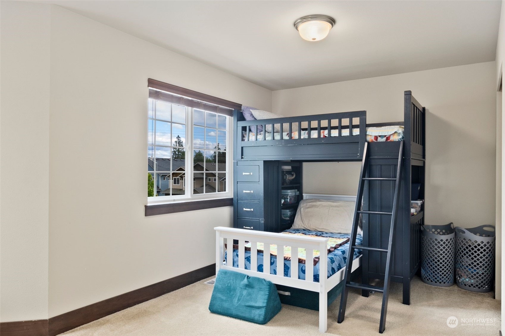 417 196th Street Southeast Bothell, WA 98012 - Photo 26 of 40 a bedroom with a bed and window