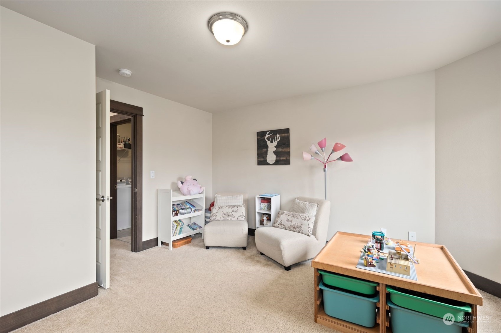 417 196th Street Southeast Bothell, WA 98012 - Photo 27 of 40 a bedroom with furniture and a window