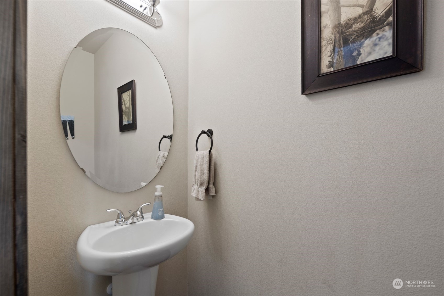 417 196th Street Southeast Bothell, WA 98012 - Photo 31 of 40 a bathroom with a sink and mirror