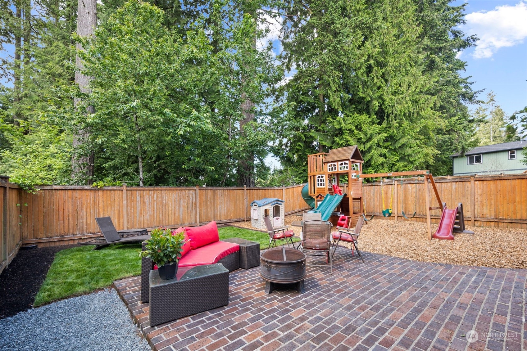417 196th Street Southeast Bothell, WA 98012 - Photo 32 of 40 a view of deck with chairs and wooden fence