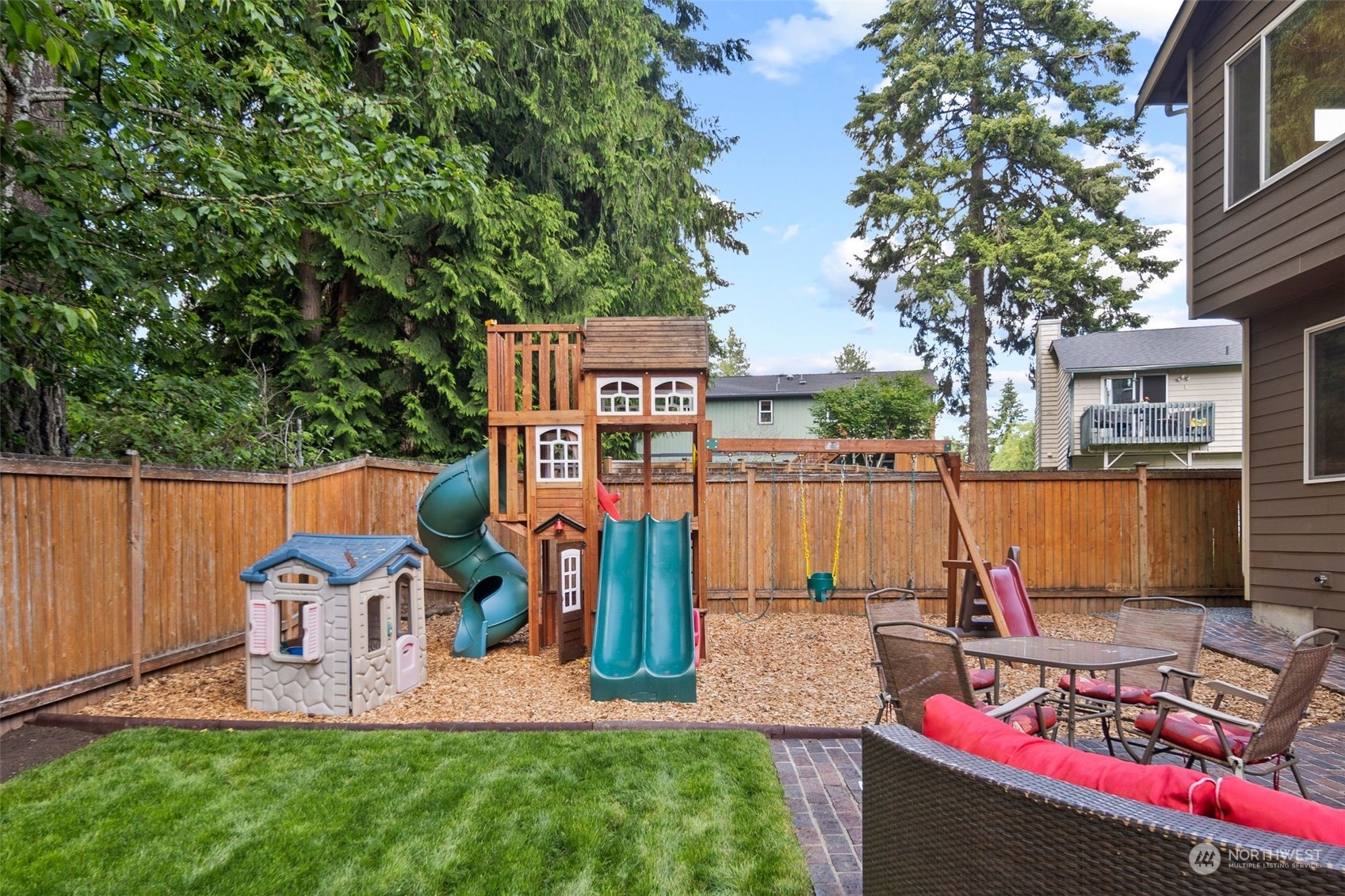 417 196th Street Southeast Bothell, WA 98012 - Photo 33 of 40 an outdoor space with seating area and slide