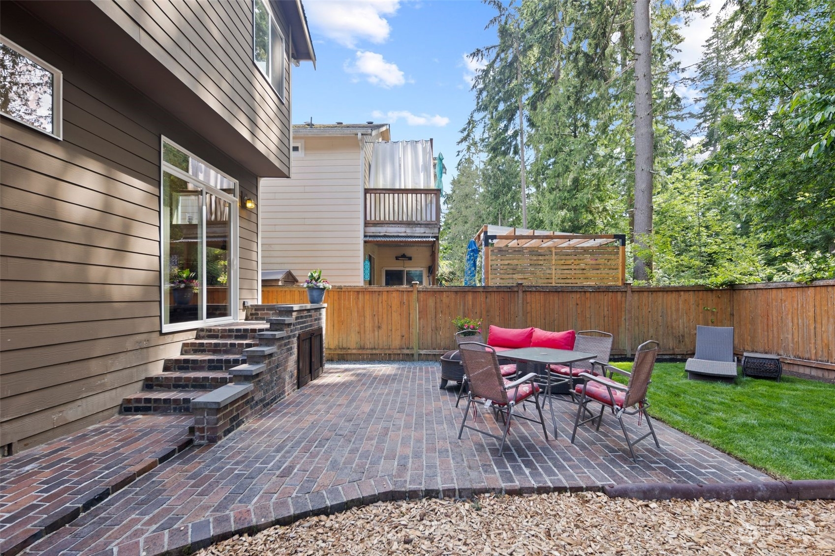 417 196th Street Southeast Bothell, WA 98012 - Photo 36 of 40 a view of a chairs and table in the patio