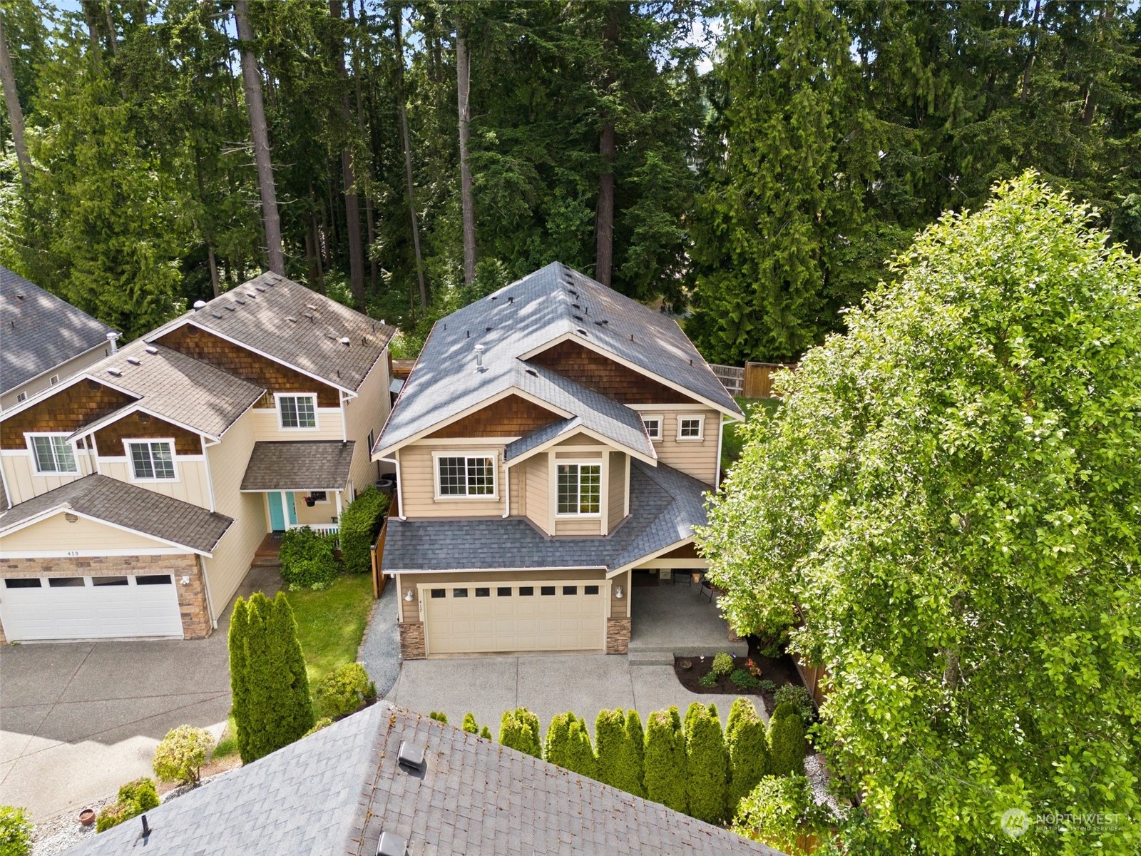 417 196th Street Southeast Bothell, WA 98012 - Photo 38 of 40 a front view of a house with garden