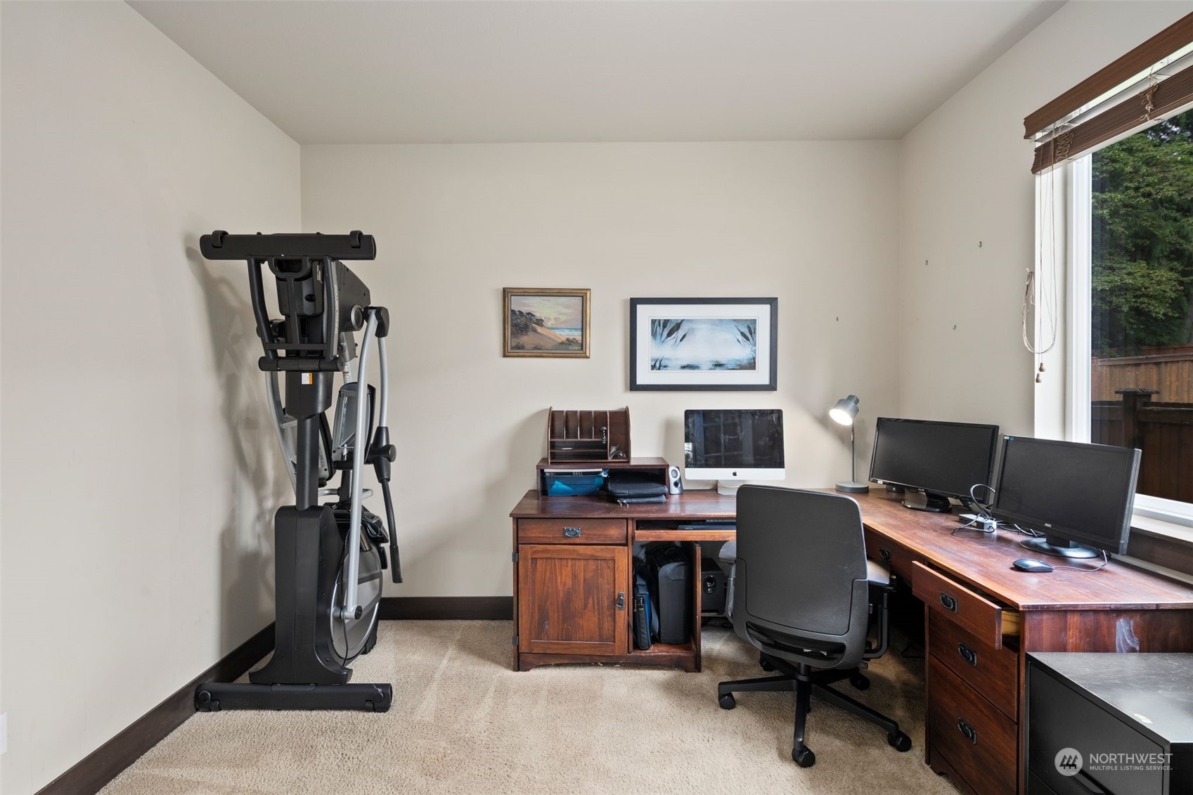 417 196th Street Southeast Bothell, WA 98012 - Photo 7 of 40 a view of a workspace with furniture and a window