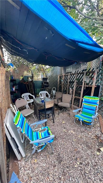 12 Brighton 3rd Road Brooklyn, NY 11235 - Photo 2 of 2 a view of a chairs and table in the patio