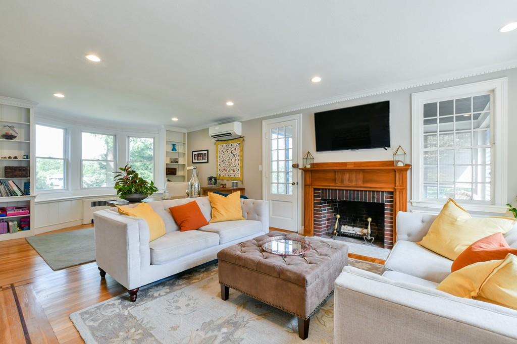 9 Hillcroft Road Boston, MA 02130 - Photo 11 of 29 a living room with furniture fireplace and flat screen tv