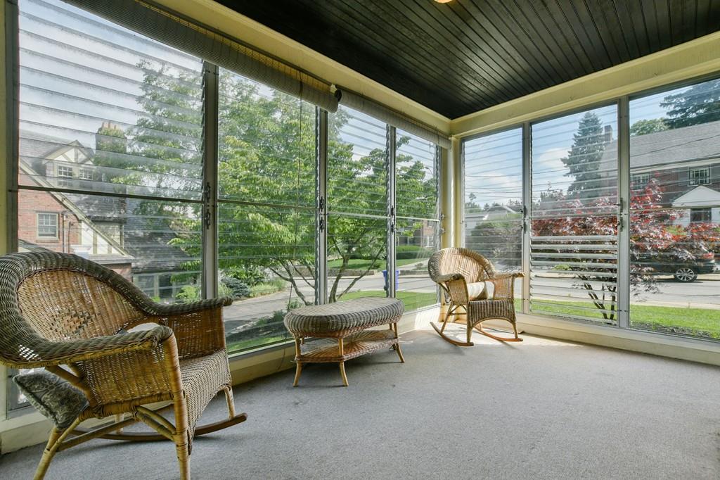 9 Hillcroft Road Boston, MA 02130 - Photo 24 of 29 a living room with a large window and chairs