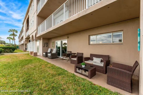 a building outdoor space with patio furniture