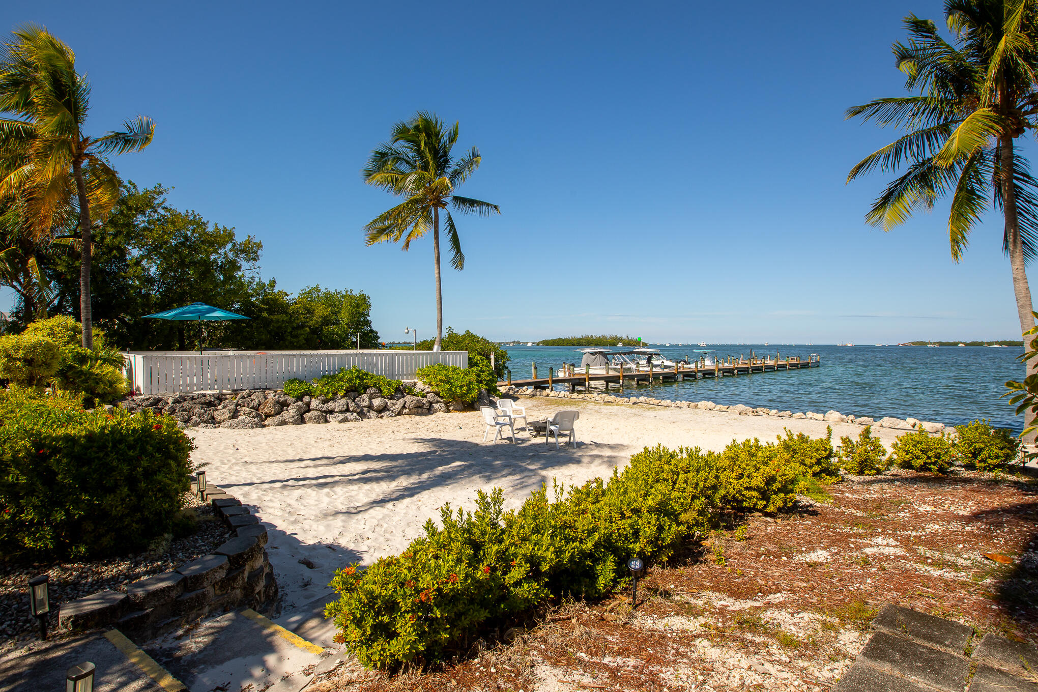 30 Hilton Haven Road, Unit 2A Key West, FL 33040 - Photo 34 of 36 a view of a lake with a palm tree