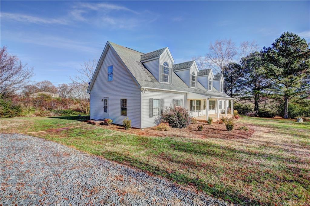 2006 Long Hope Road Monroe, NC 28112 - Photo 2 of 34 a front view of house with yard and seating area