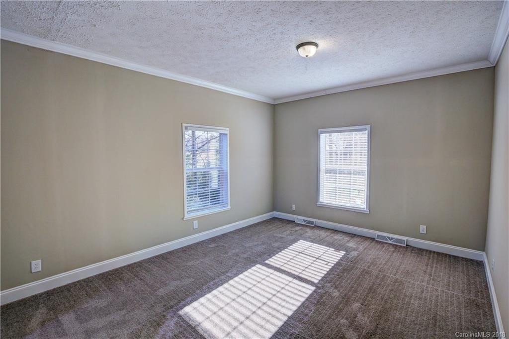 2006 Long Hope Road Monroe, NC 28112 - Photo 17 of 34 an empty room with windows