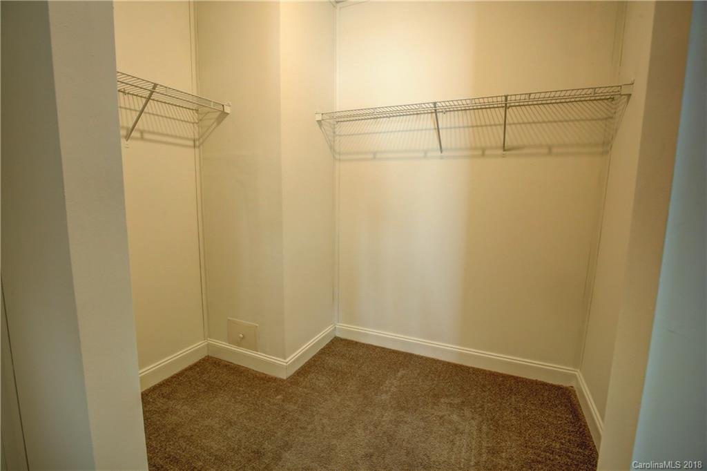2006 Long Hope Road Monroe, NC 28112 - Photo 21 of 34 a view of a room with racks on the wall