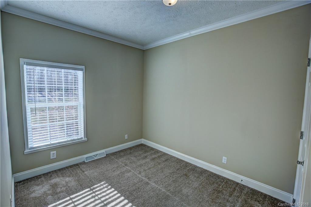 2006 Long Hope Road Monroe, NC 28112 - Photo 27 of 34 an empty room with a window