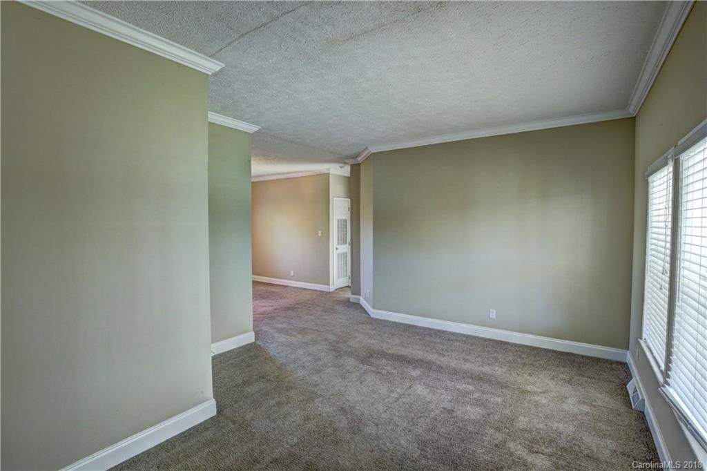 2006 Long Hope Road Monroe, NC 28112 - Photo 6 of 34 an empty room with windows