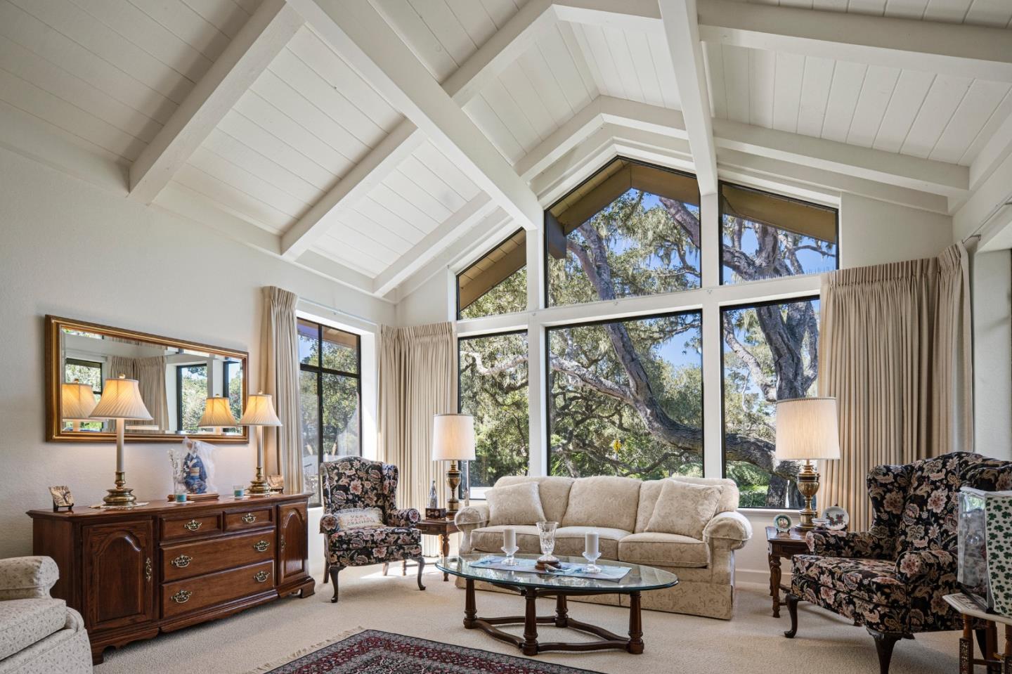 2911 Colton Road Pebble Beach, CA 93953 - Photo 6 of 46 a living room with furniture and large windows
