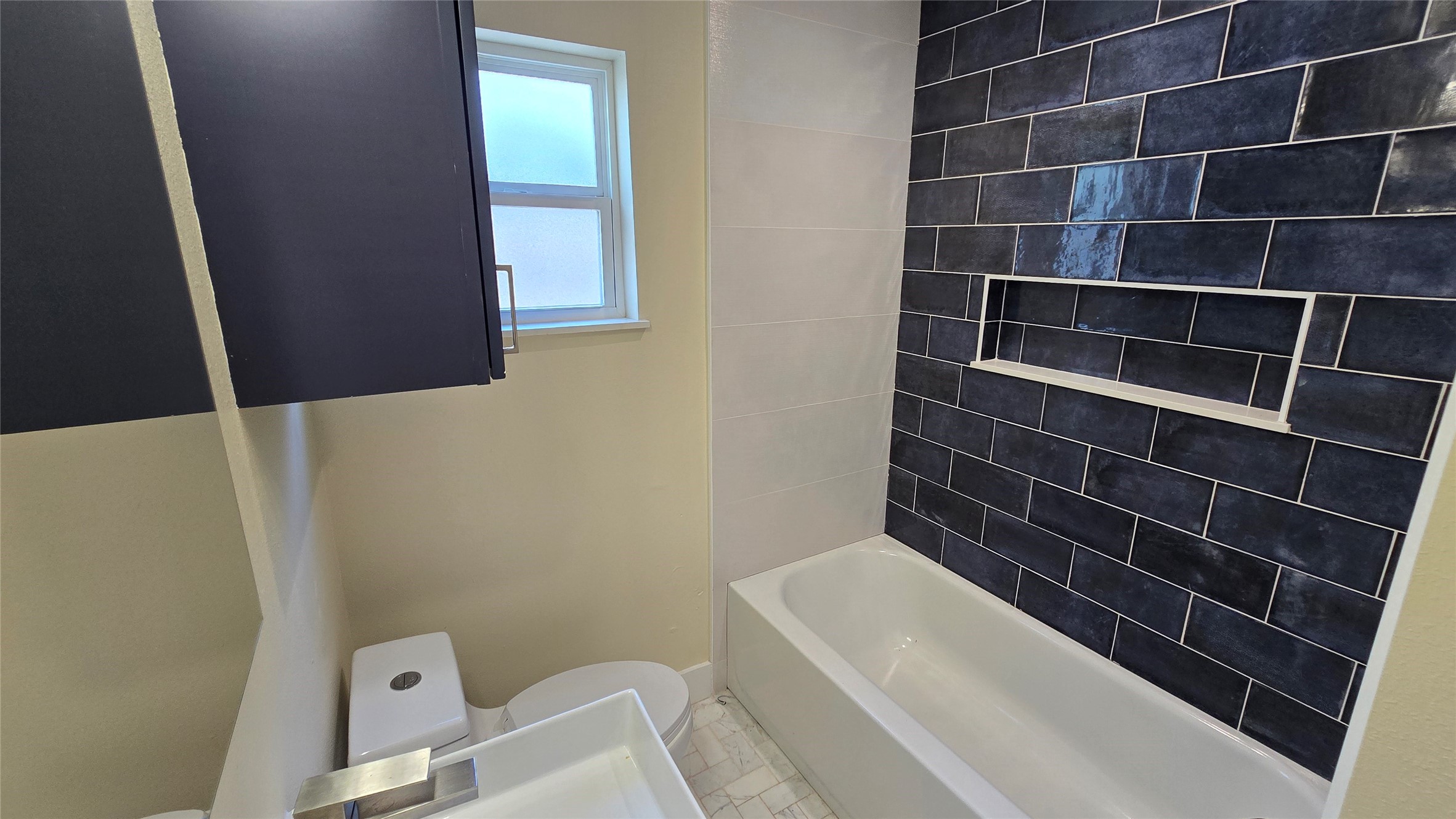 3741 Seabrook Street Houston, TX 77021 - Photo 11 of 50 a bathroom with a sink and toilet